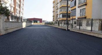 Toroslar'da yol yenileme çalışmaları sürüyor