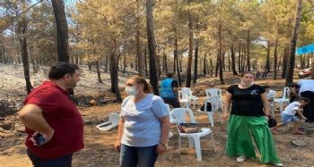 Mut Belediyesi yangın bölgesinde su ve kumanya dağıttı