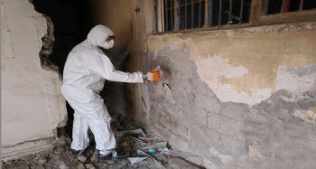 Yenişehir'de yıkılacak binalarda asbest kontrolü yapılıyor