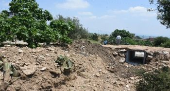Tarsus'ta sel felaketinin yaraları sarıldı