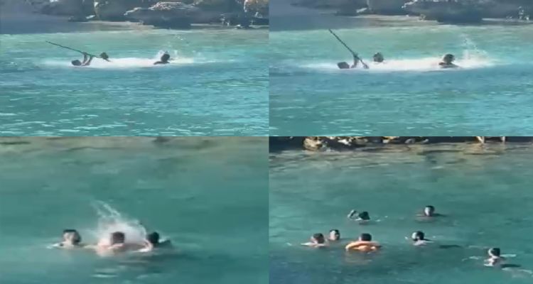 Mersin’de denizin ortasında sopalı kavga kamerada