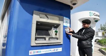 Toroslar'da banka ATM'lerine dezenfektan ünitesi yerleştirildi