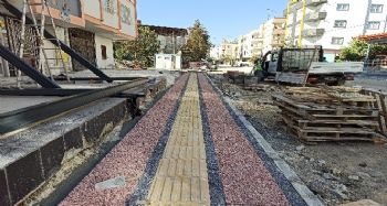 Büyükşehir Belediyesi, Tarsus'un mahallelerini asfaltlamaya devam ediyor