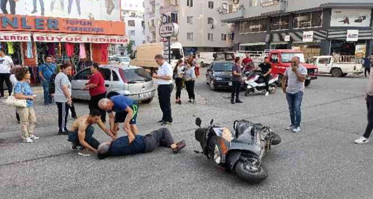Motosiklet sürücüsü köpeğe çarpmamak isterken düşerek yaralandı